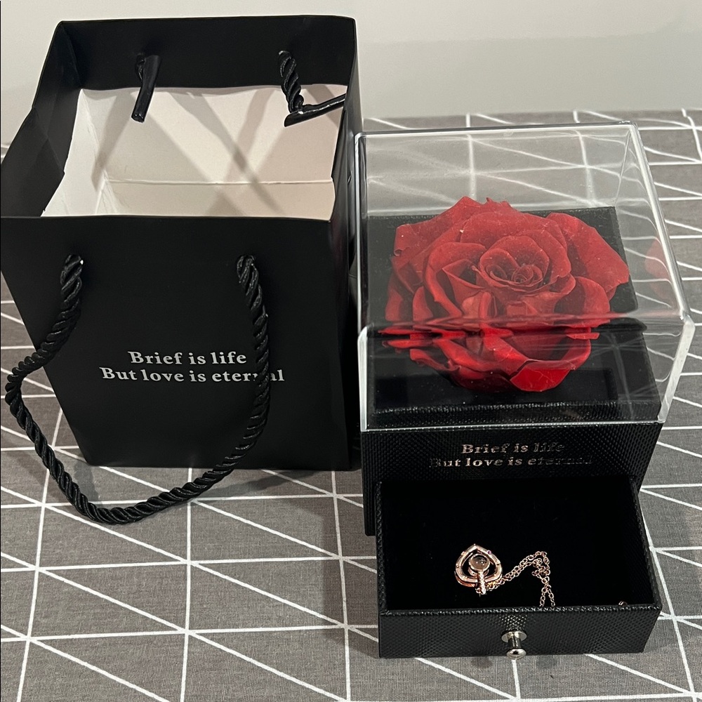 Black Jewelry Box with Red Rose and Necklace